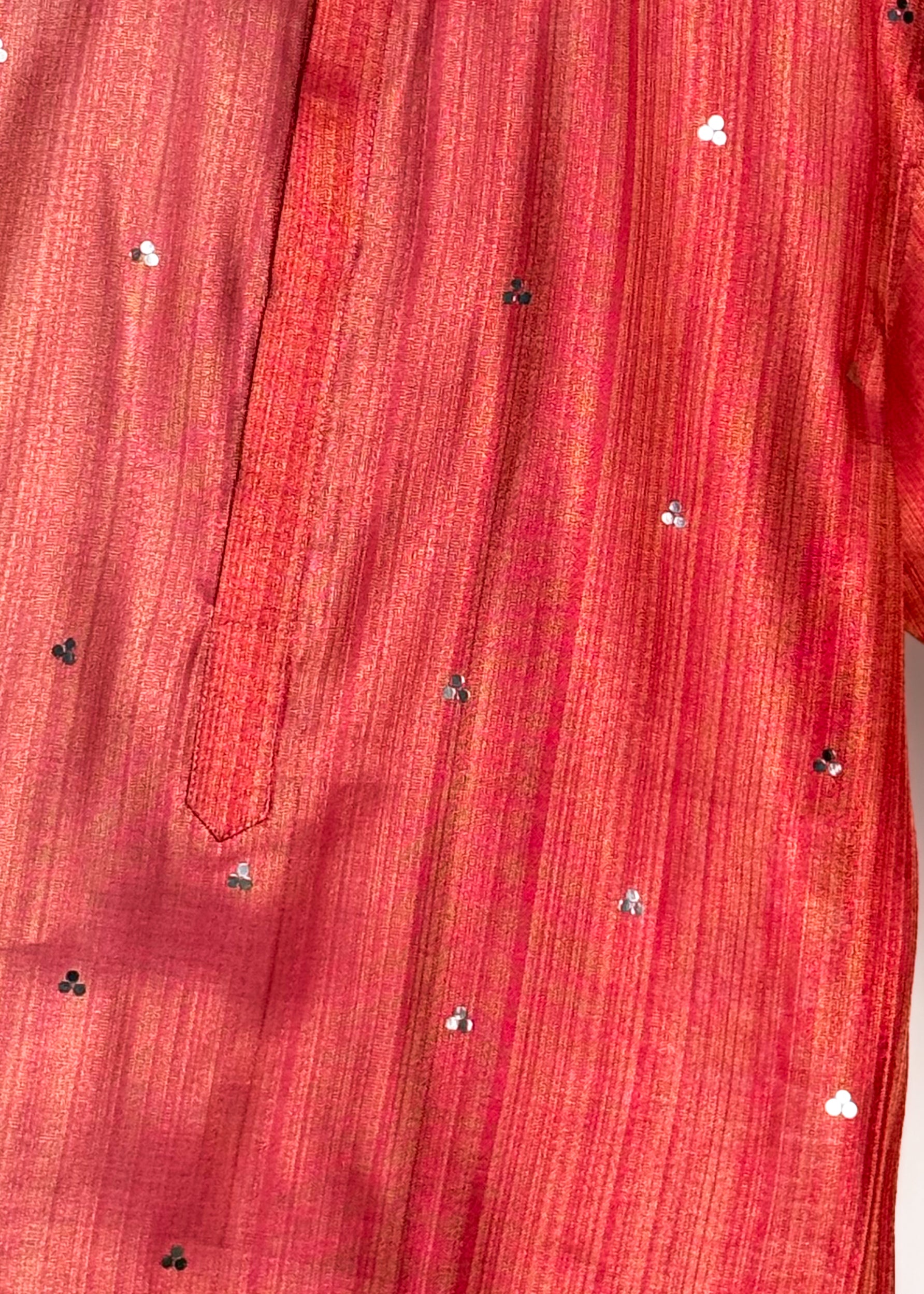 Men’s pink mirror-work kurta with shade-work ombré and continuous gold zari lines