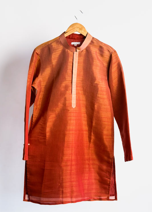 Rust shade-work men’s kurta with subtle gold zari texture and band collar