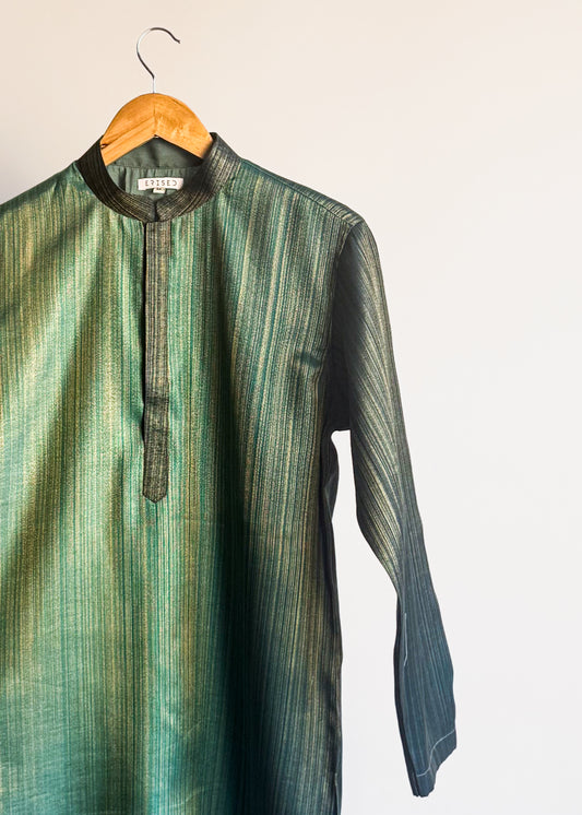 Teal green plain kurta with shade-work ombré and continuous gold zari lines
