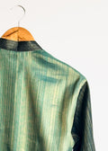 Teal green plain kurta with shade-work ombré and continuous gold zari lines