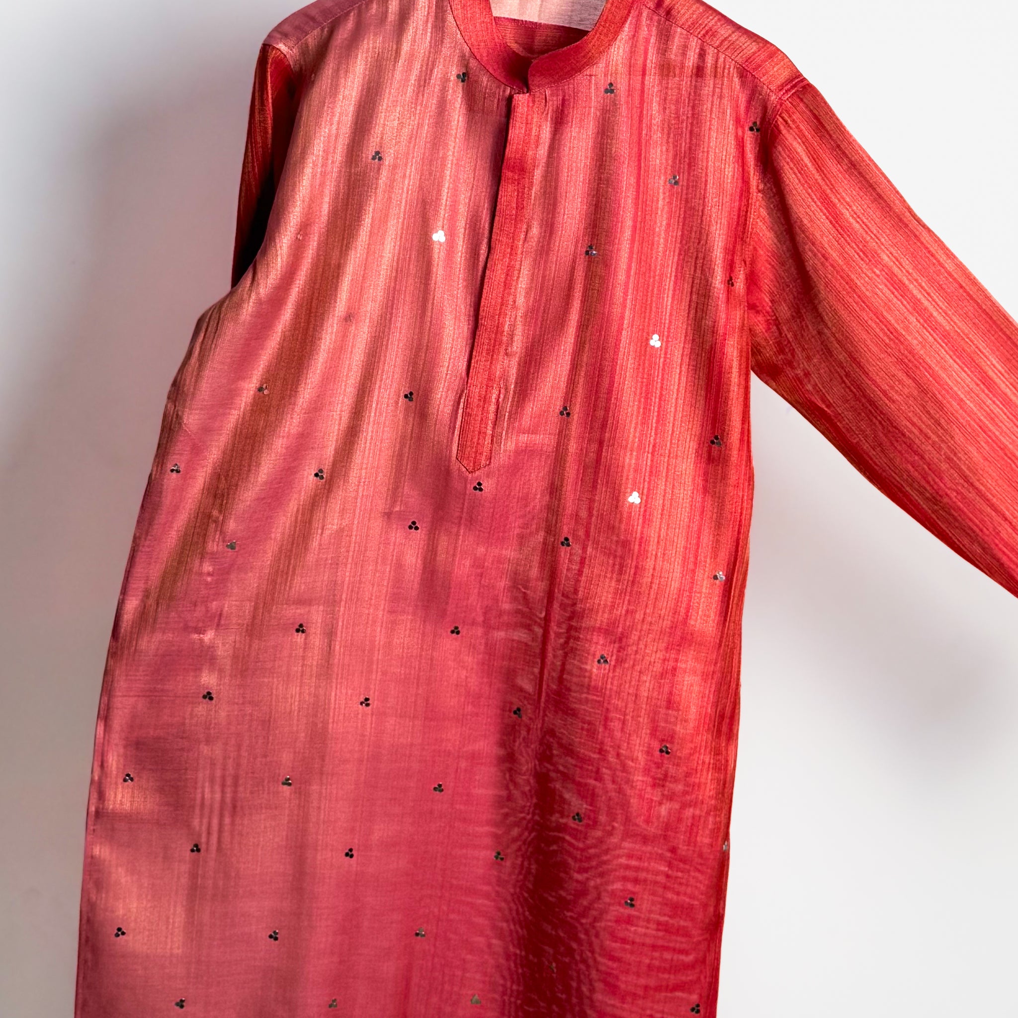 Men’s pink mirror-work kurta with shade-work ombré and continuous gold zari lines